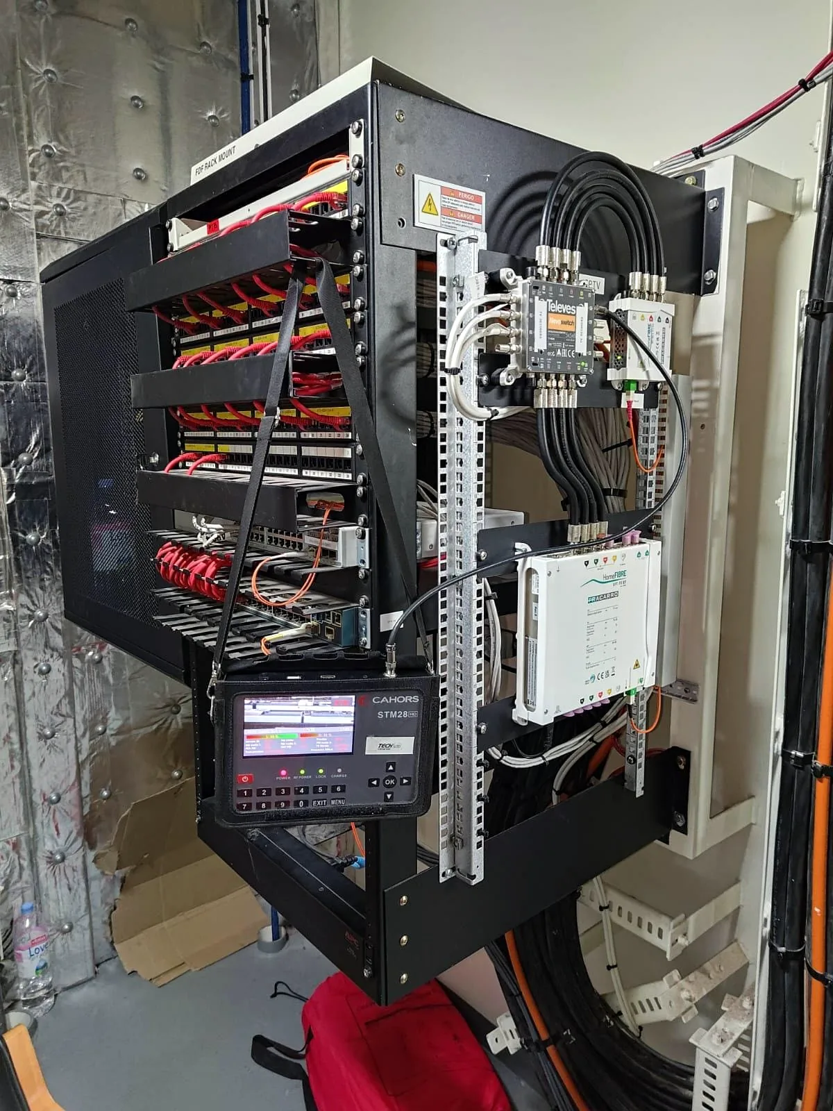 Satellite TV receivers installed in a rack