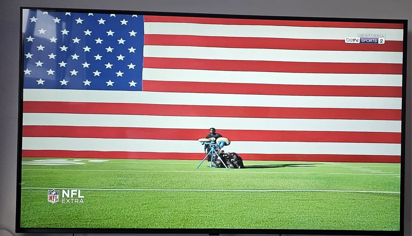 Live sport on a TV screen onboard